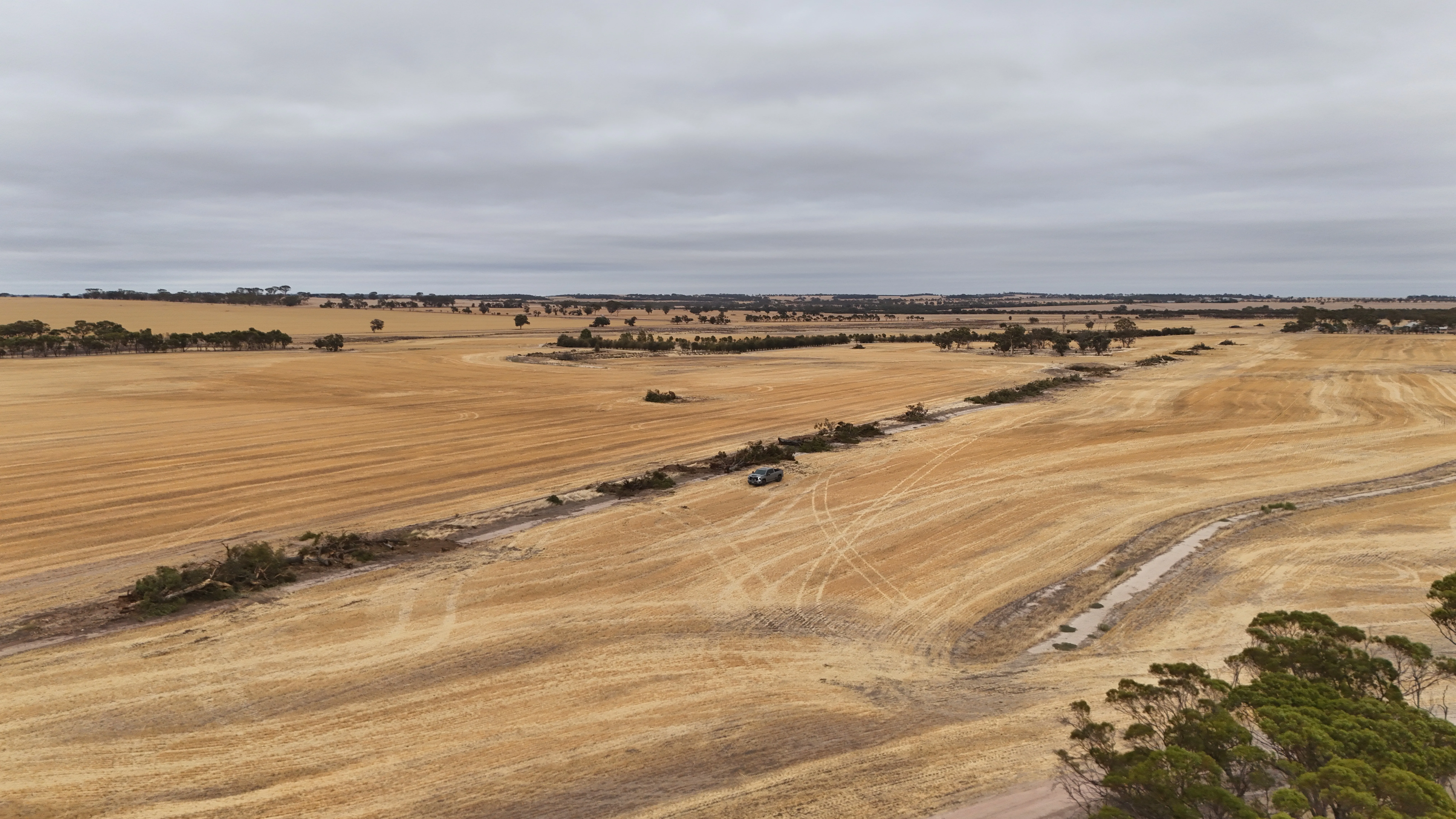 Heavy earthmoving equipment working on a WA farm site